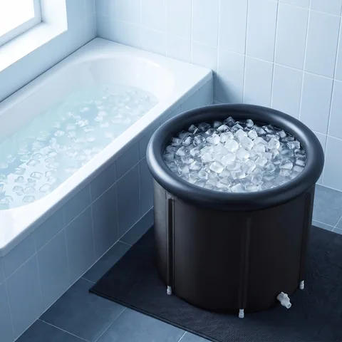 Top view of a bathtub, a plastic stock tank and the black round insulated tub, drawn side by side on a pale blue background, no text